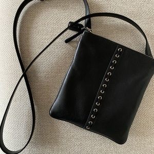 COACH black leather cross-body bag.
